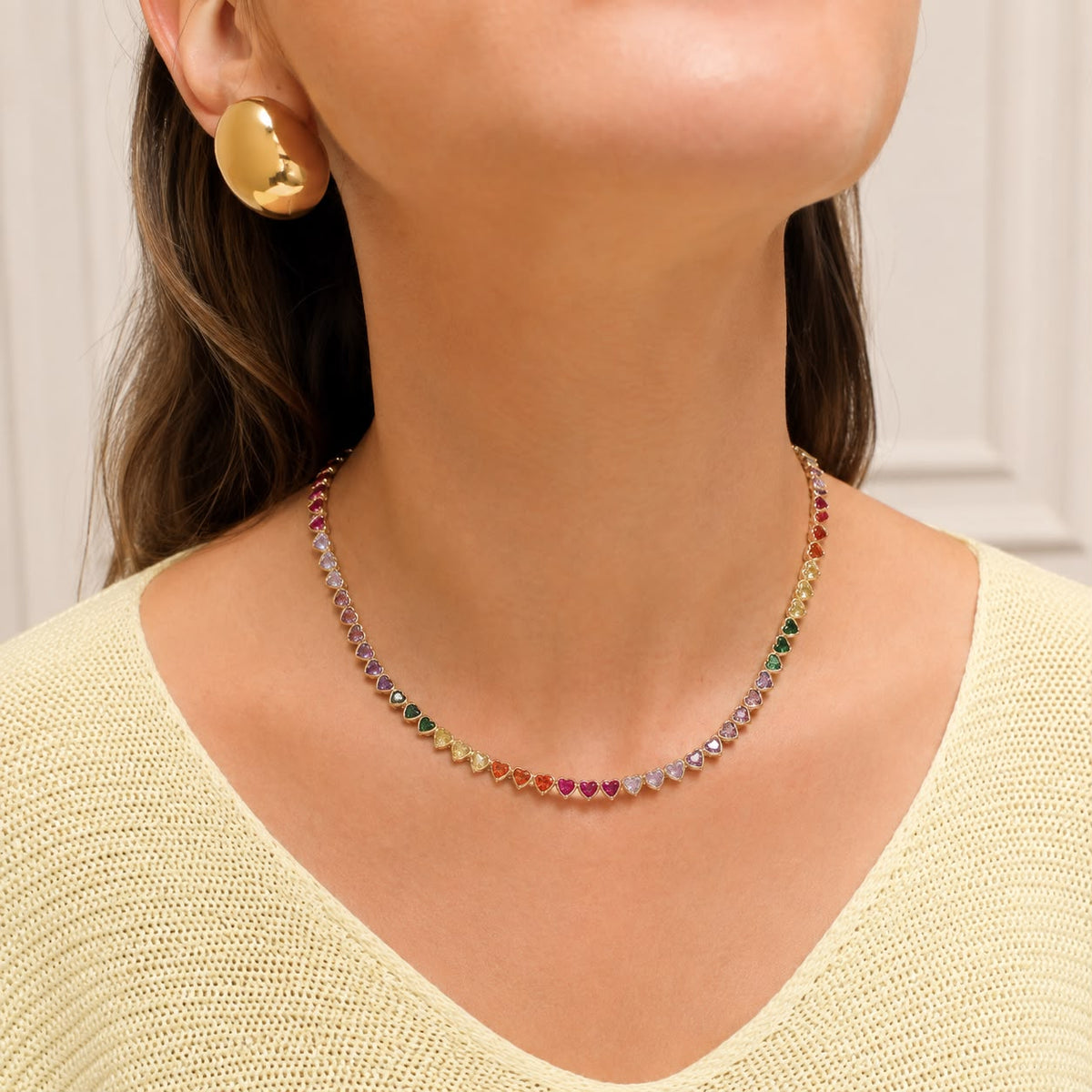 Model wearing Lyora Rainbow Heart Tennis Bracelet