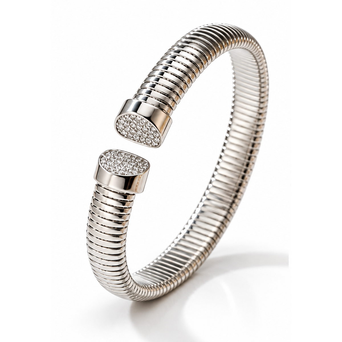 Lyora silver-tone ribbed open cuff bracelet with CZ-studded ends on white