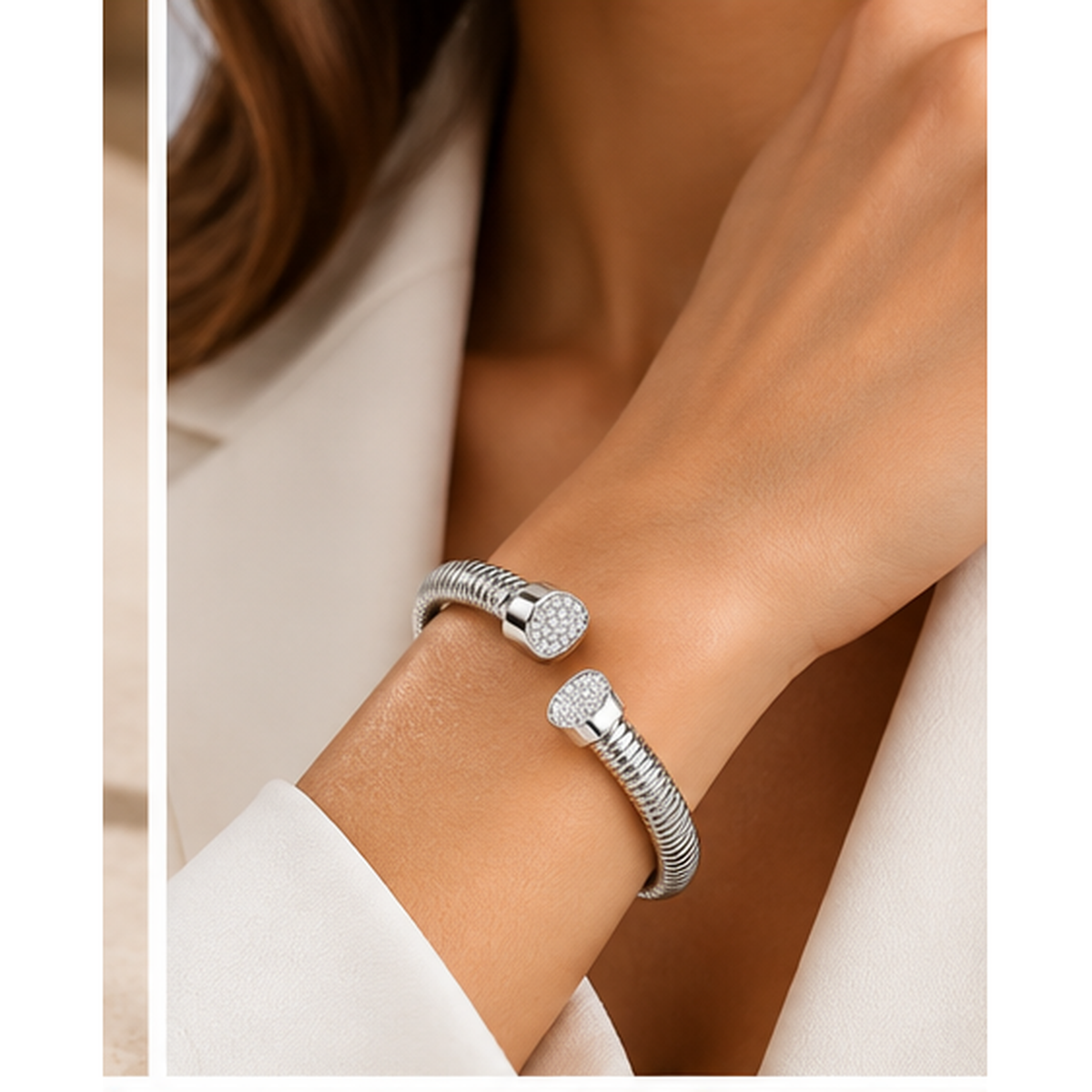 Model wearing Lyora silver-tone ribbed open cuff with cubic zirconia