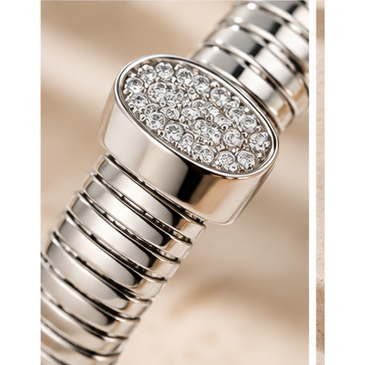 Macro of Lyora silver-tone ribbed open cuff and cubic zirconia accents