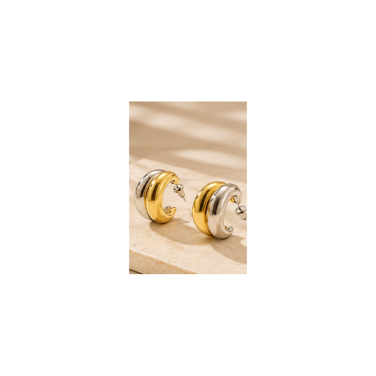 Alternate view of Lyora two-tone chunky huggie hoop earrings